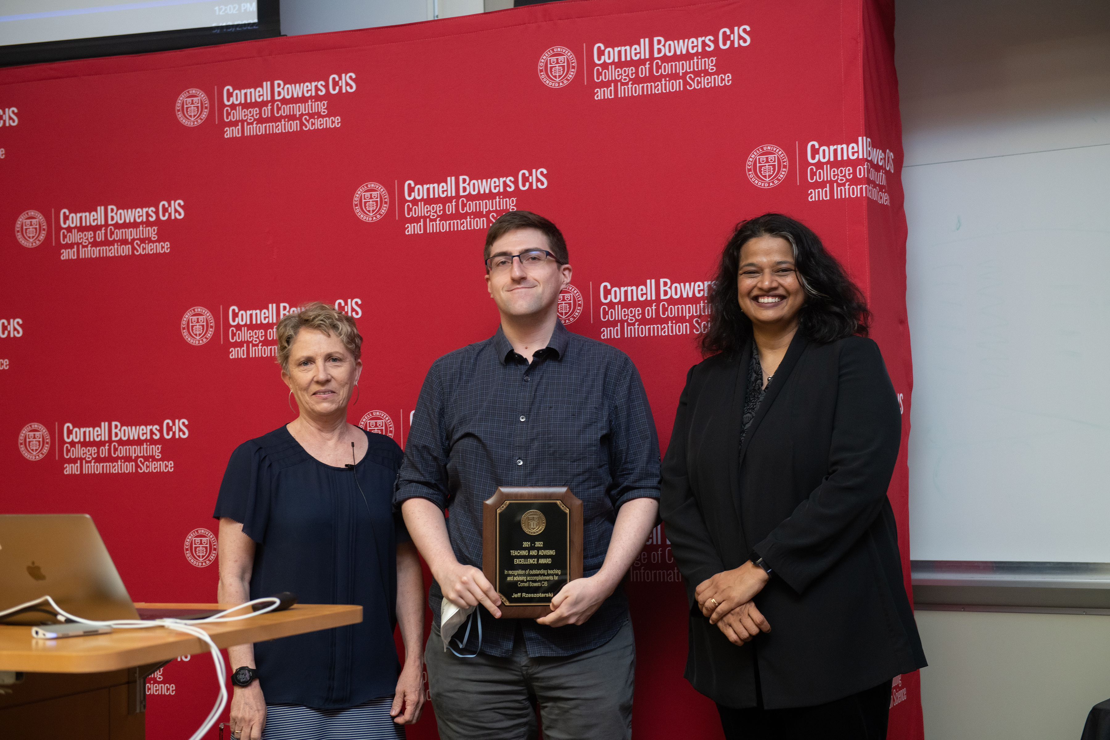Jeff Rzeszotarski, assistant professor of information science, receives the Teaching and Advising Excellence award during a reception held May 13, 2022.