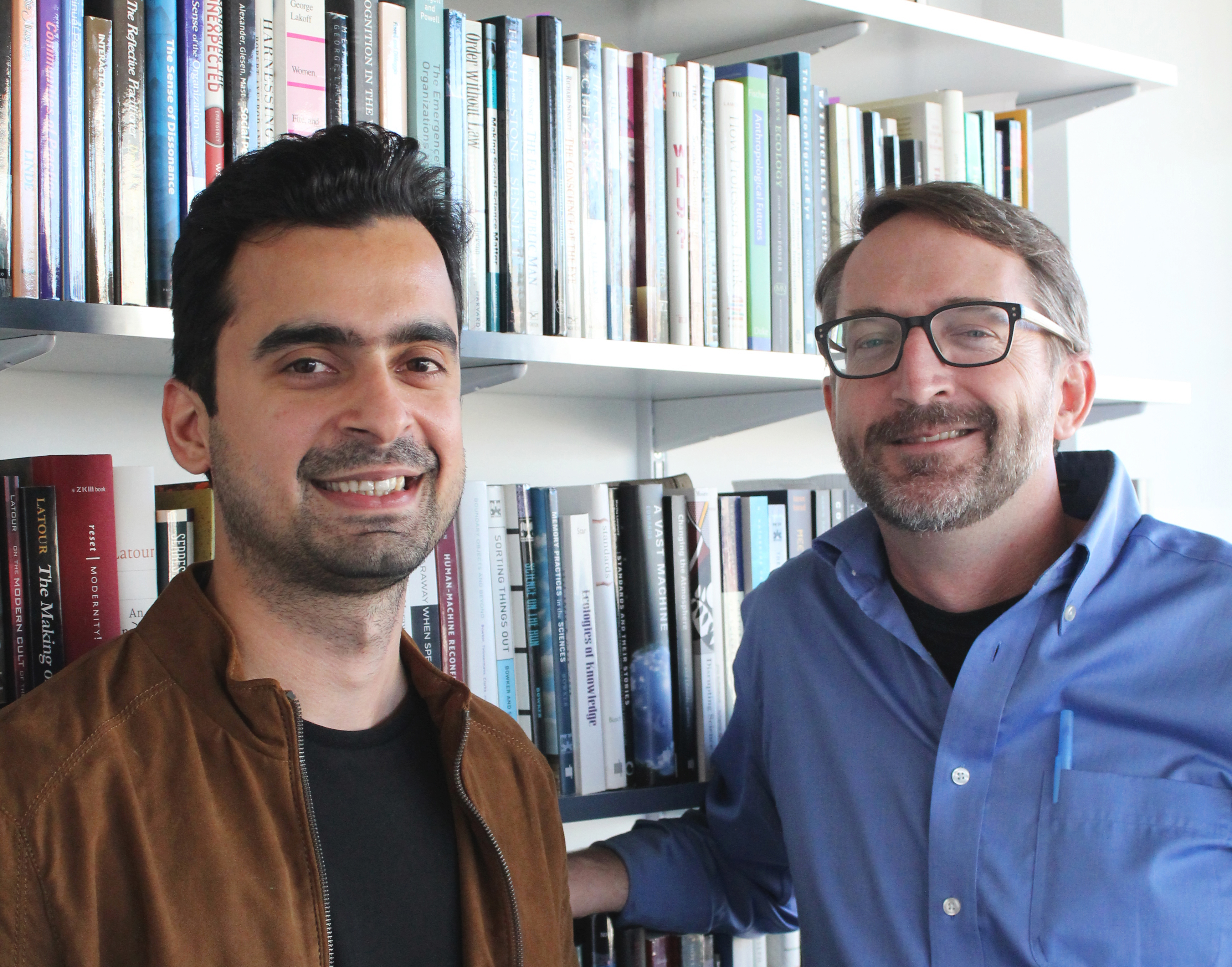 Samir Passi (left) and Steve Jackson, associate professor of Information Science.