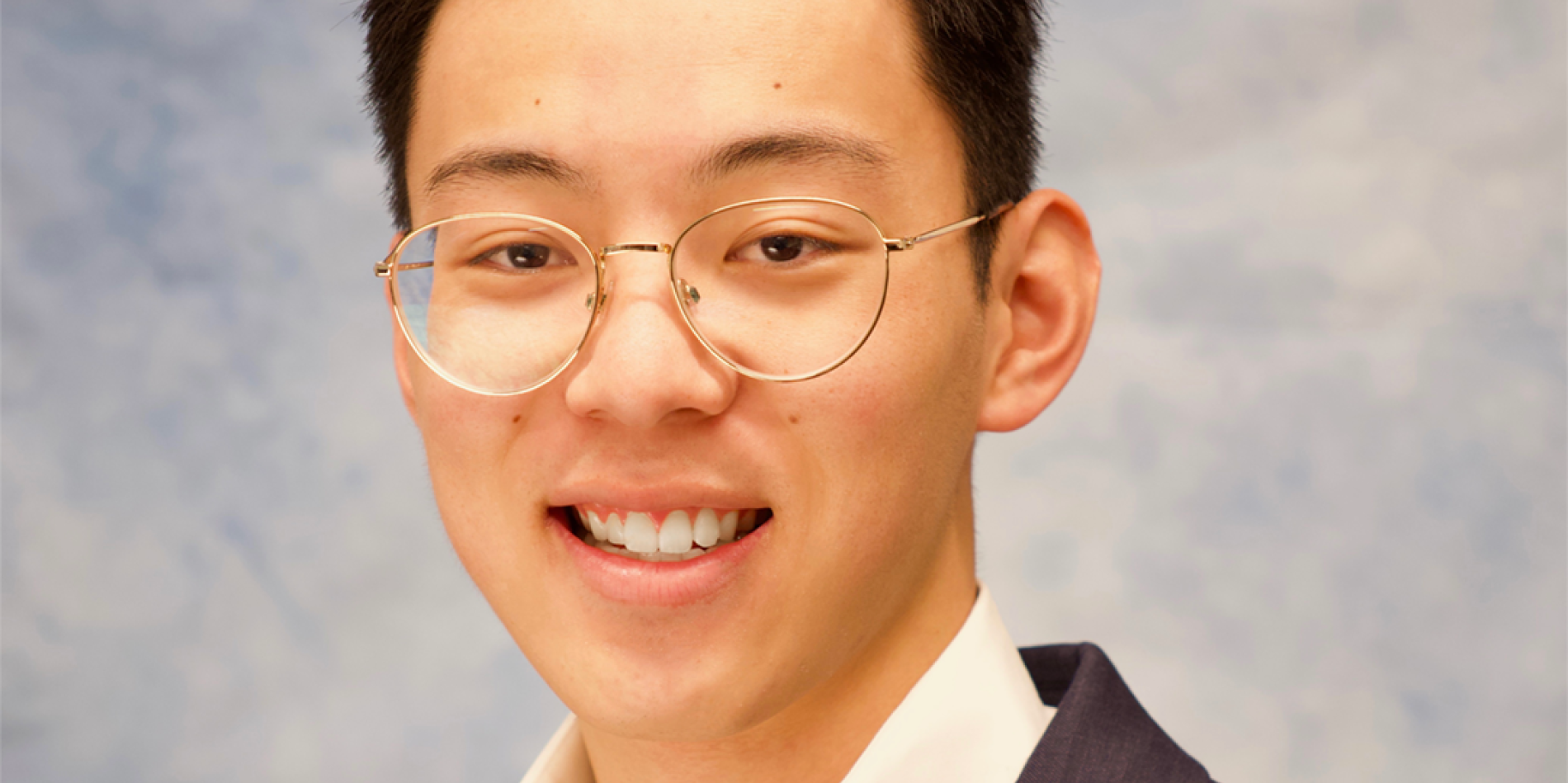 color portrait of Matthew Roohan, smiling at camera
