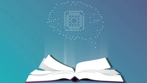 A book with white pages lies open while a brain with a computer chip in the center lies above it