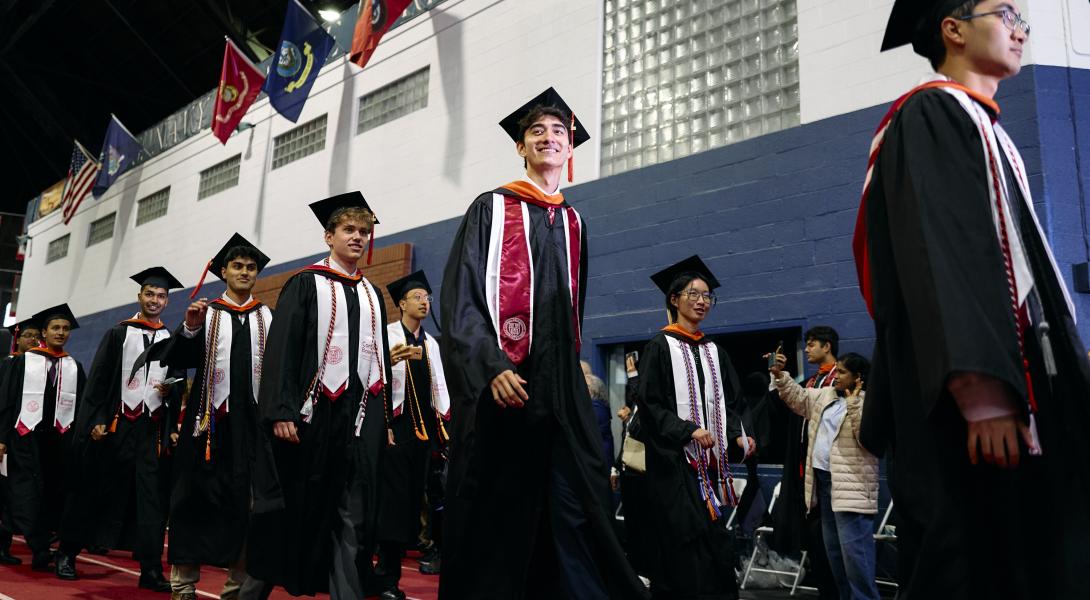 students walk into the ceremony at Barton Hall